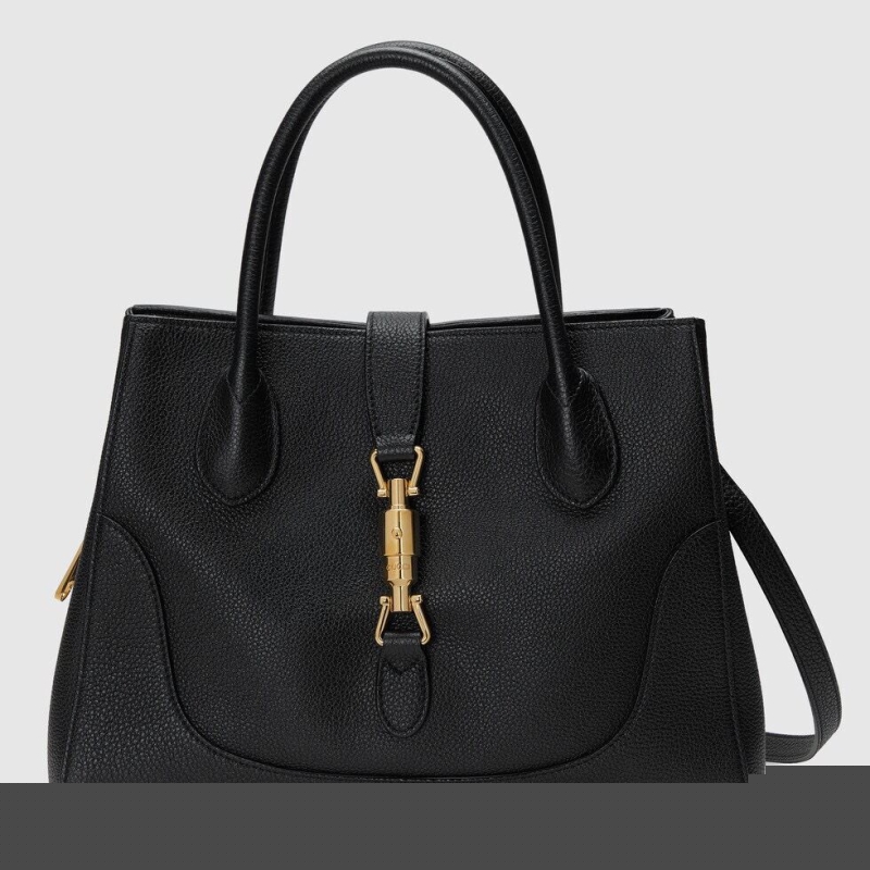 G*u*i shopping bags